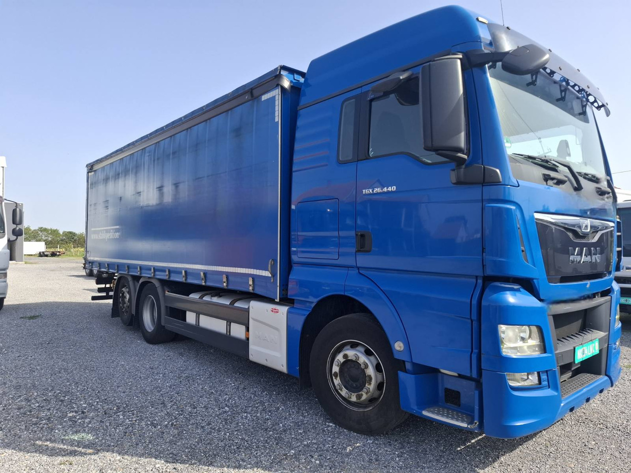 MAN TGX 26.440 E6 - Camion à rideaux coulissants: photos 1 MAN TGX 26.440 E6 - Camion à rideaux coulissants: photos 1