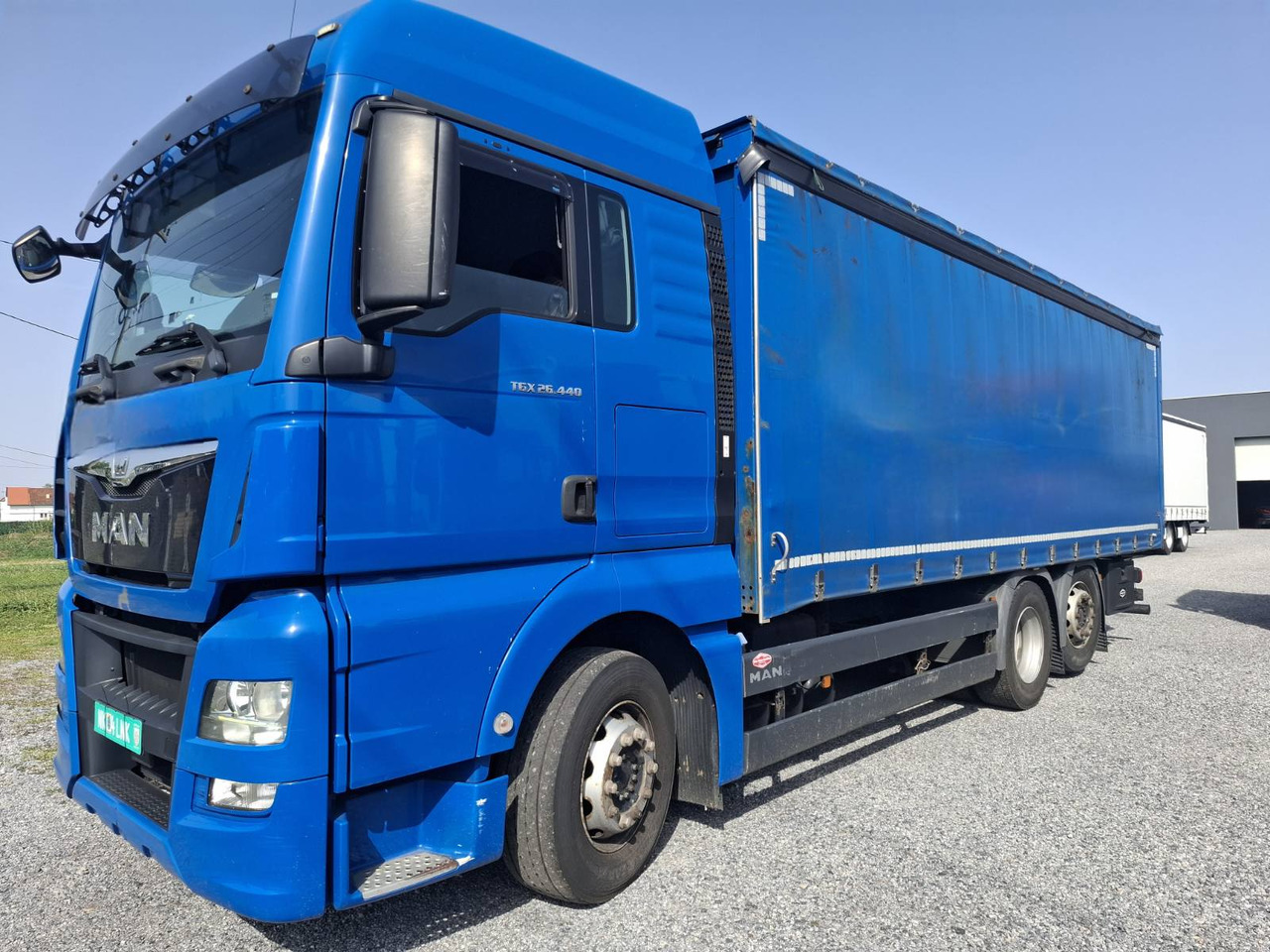 MAN TGX 26.440 E6 - Camion à rideaux coulissants: photos 3 MAN TGX 26.440 E6 - Camion à rideaux coulissants: photos 3