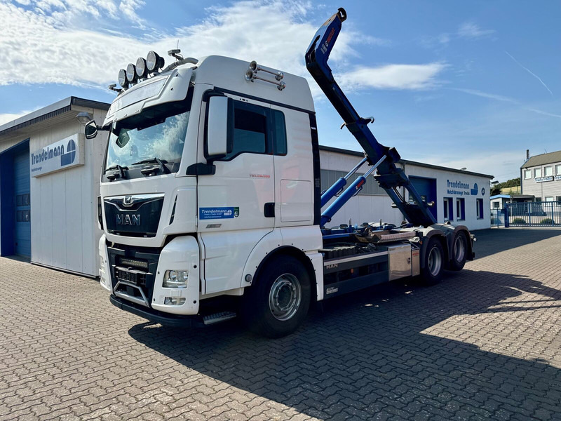MAN TGX 26.580 BL 6x2 Zwillingbereifte Liftachse Abroller Hiab Funk- - Camion ampliroll: photos 1 MAN TGX 26.580 BL 6x2 Zwillingbereifte Liftachse Abroller Hiab Funk- - Camion ampliroll: photos 1