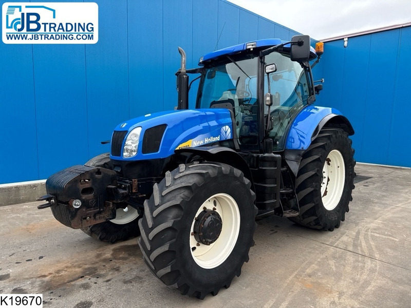 New Holland T6080 - Tracteur agricole: photos 1 New Holland T6080 - Tracteur agricole: photos 1