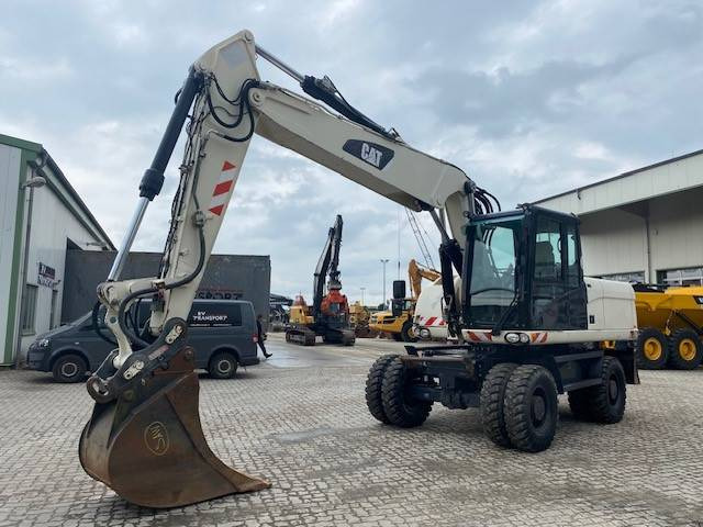 Cat M 318 D VAH (12005443) - Pelle sur pneus: photos 1 Cat M 318 D VAH (12005443) - Pelle sur pneus: photos 1