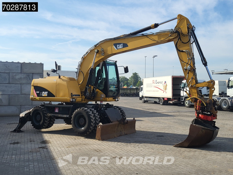 Pelle sur pneus Caterpillar M313 D OUTRIGGERS + BLADE: photos 9