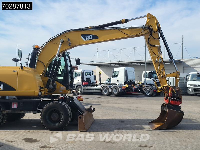 Pelle sur pneus Caterpillar M313 D OUTRIGGERS + BLADE: photos 11