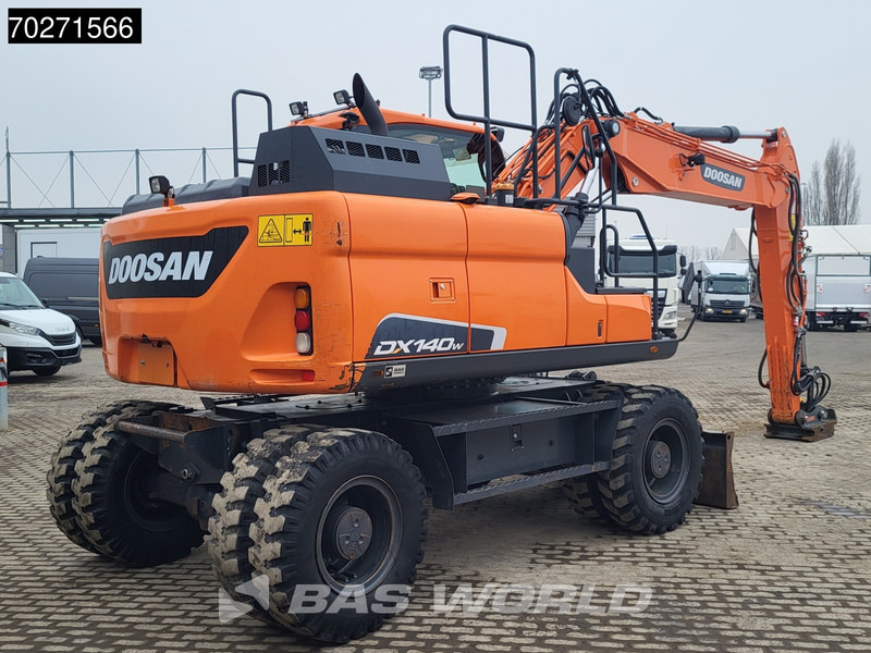 Doosan DX140 W-5 OIL QUICK - GERMAN - Pelle sur pneus: photos 5 Doosan DX140 W-5 OIL QUICK - GERMAN - Pelle sur pneus: photos 5