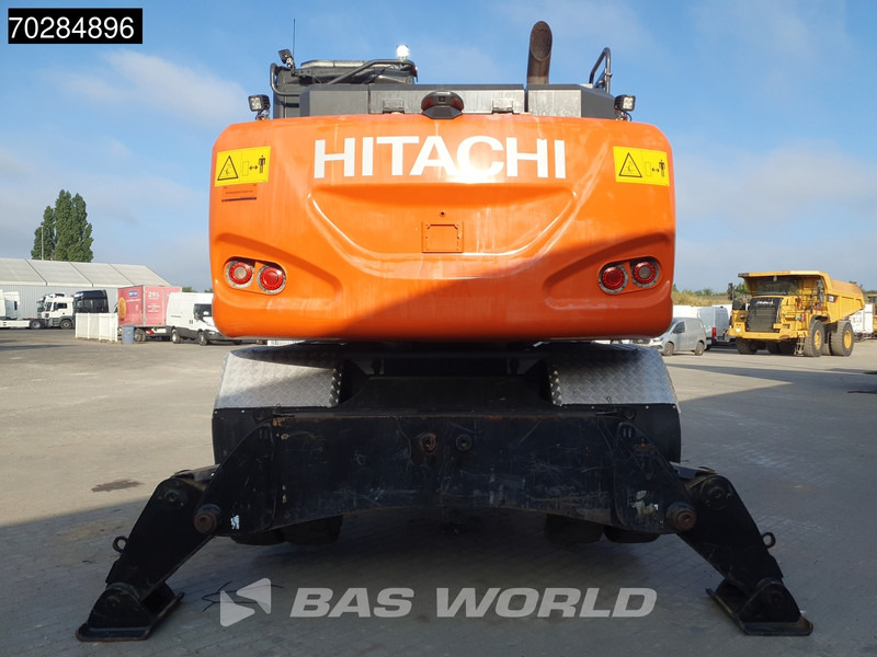 Hitachi ZX140W -6 OUTRIGGERS + BLADE - Pelle sur pneus: photos 3 Hitachi ZX140W -6 OUTRIGGERS + BLADE - Pelle sur pneus: photos 3