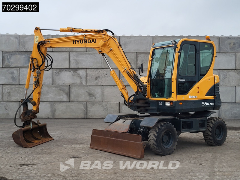 Hyundai Robex 55W-9A EPA - Pelle sur pneus: photos 3 Hyundai Robex 55W-9A EPA - Pelle sur pneus: photos 3