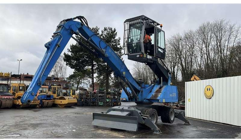 Fuchs MHL320 - Pelle de manutention: photos 1 Fuchs MHL320 - Pelle de manutention: photos 1
