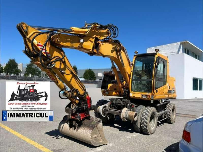 Hyundai ROBEX 140W-7 - Pelle sur pneus: photos 1 Hyundai ROBEX 140W-7 - Pelle sur pneus: photos 1