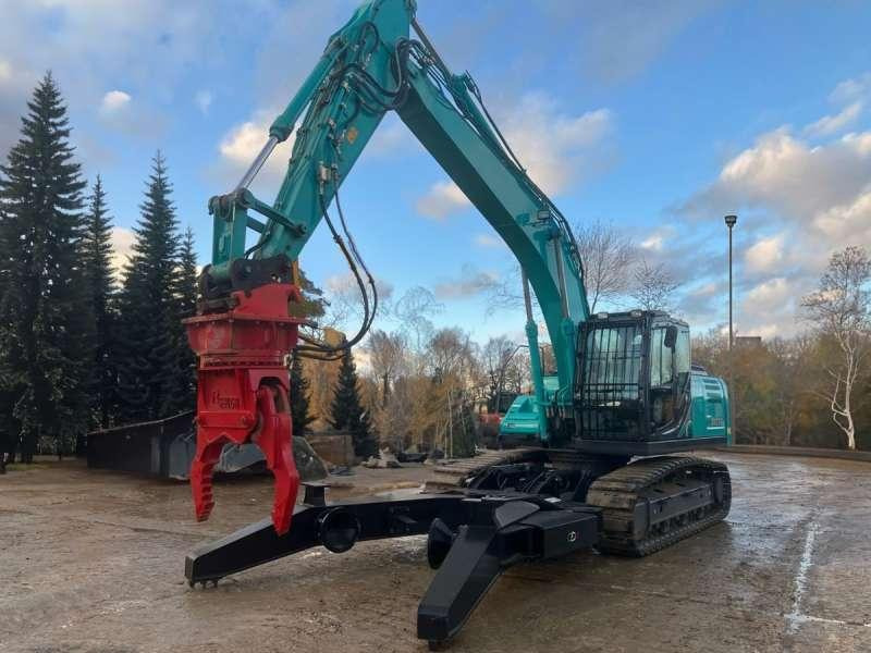 Kobelco SK210LC-10E - Pelle de manutention: photos 2 Kobelco SK210LC-10E - Pelle de manutention: photos 2