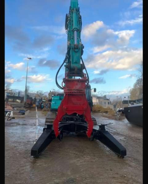 Kobelco SK210LC-10E - Pelle de manutention: photos 5 Kobelco SK210LC-10E - Pelle de manutention: photos 5