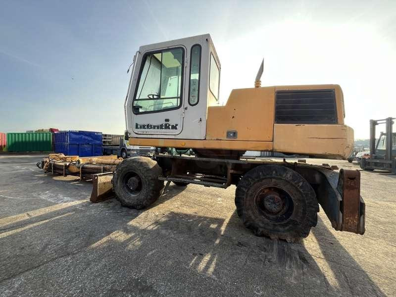 Pelle sur pneus Liebherr A316 - POUR PIECES: photos 6