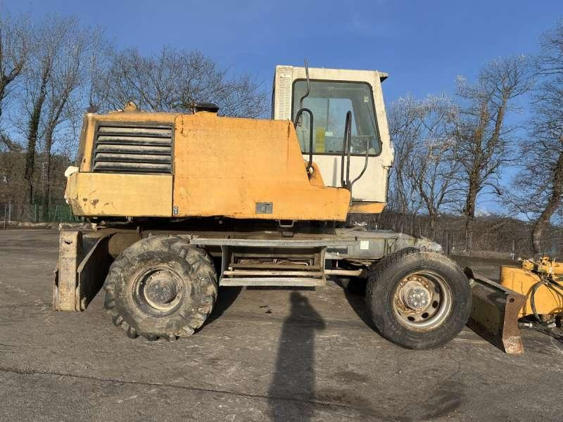 Pelle sur pneus Liebherr A316 - POUR PIECES: photos 13