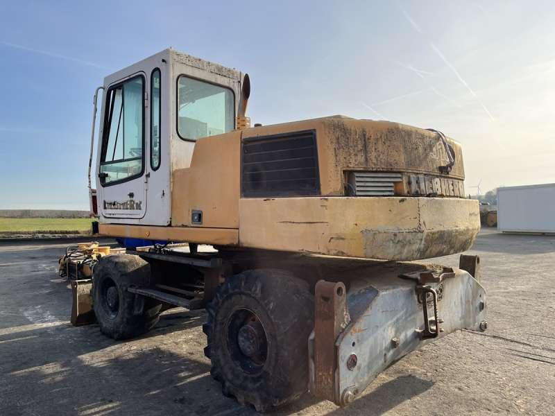 Pelle sur pneus Liebherr A316 - POUR PIECES: photos 8