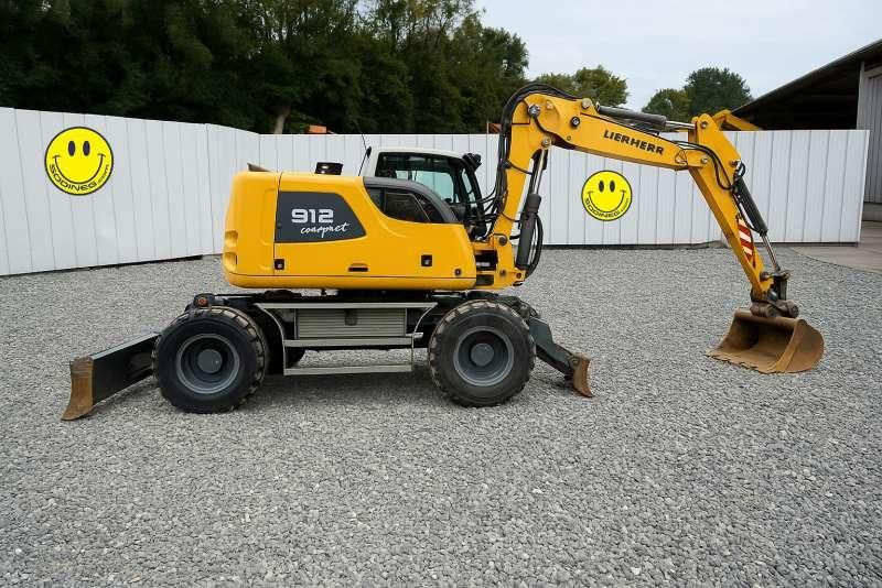 Liebherr A912 COMPACT - Pelle sur pneus: photos 1 Liebherr A912 COMPACT - Pelle sur pneus: photos 1