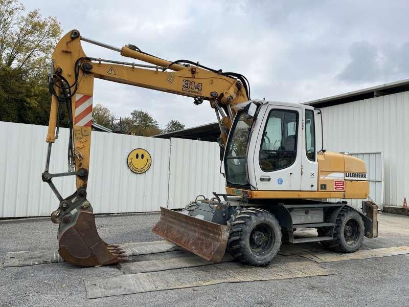 Liebherr Pelle sur Pneus A314 LITRONIC - Pelle sur pneus: photos 1 Liebherr Pelle sur Pneus A314 LITRONIC - Pelle sur pneus: photos 1