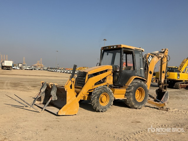 2000 Cat 426C 4x4 Backhoe Loader - Tractopelle: photos 1 2000 Cat 426C 4x4 Backhoe Loader - Tractopelle: photos 1