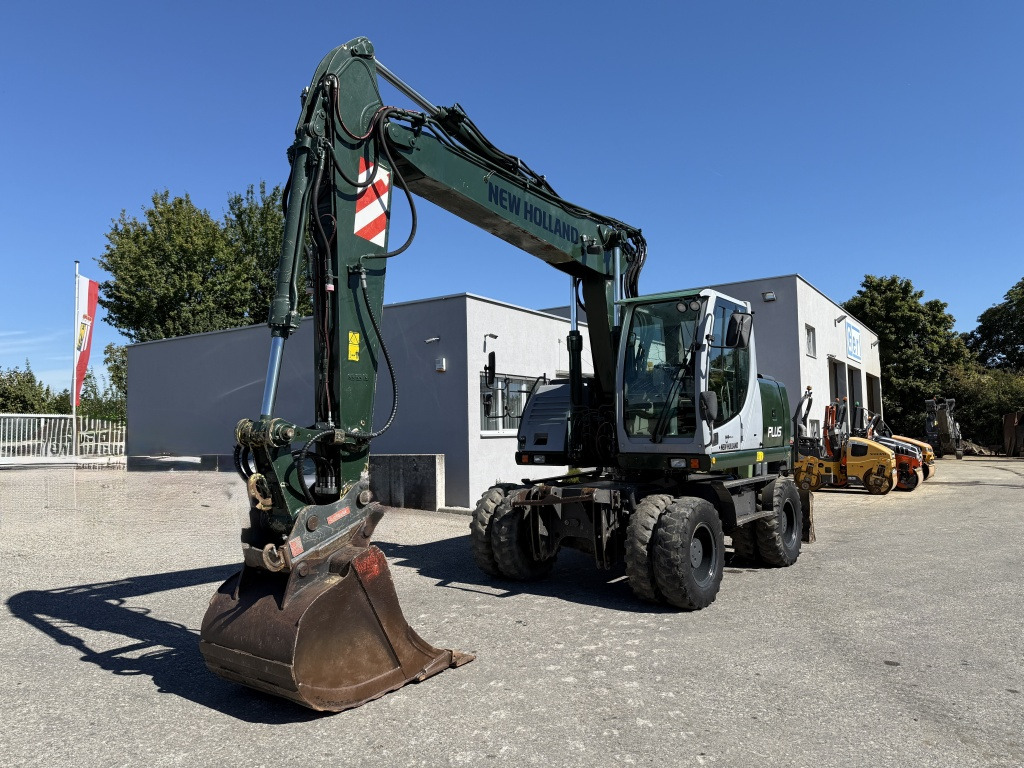 New Holland MH-Plus (111695) - Pelle sur pneus: photos 3 New Holland MH-Plus (111695) - Pelle sur pneus: photos 3
