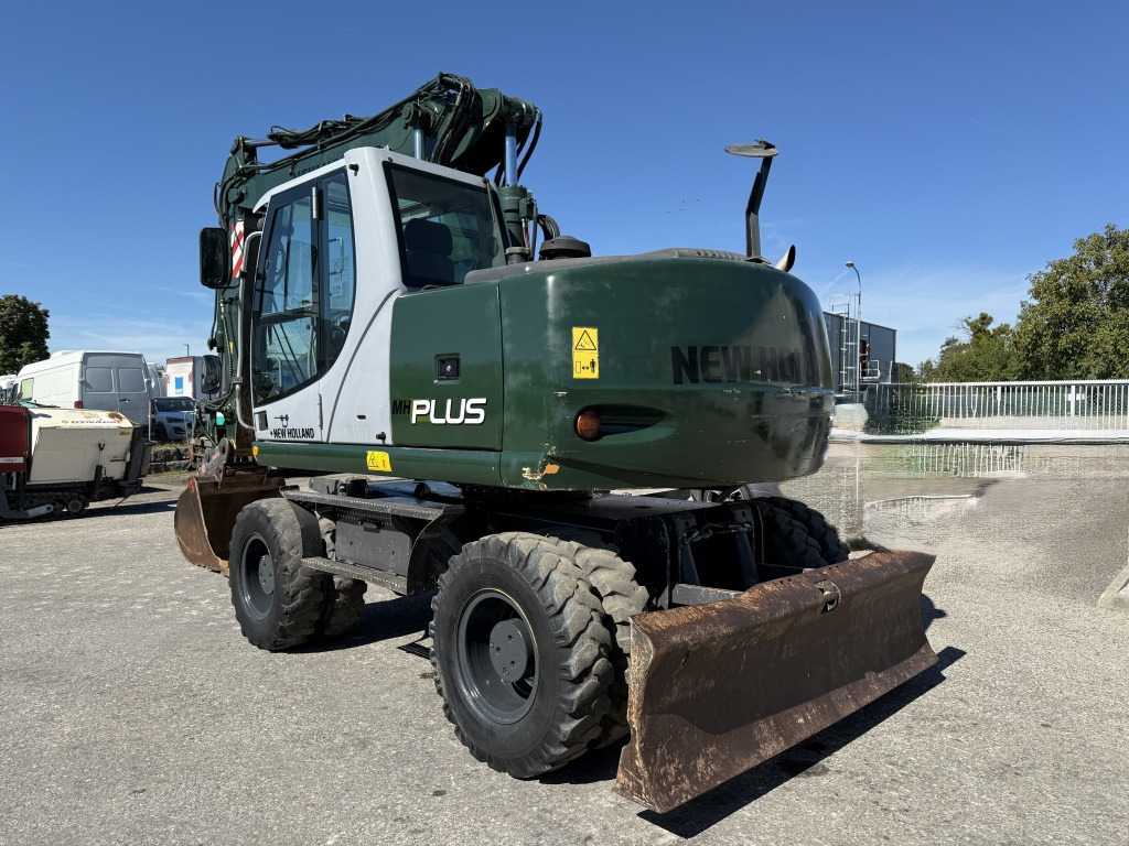 New Holland MH-Plus (111695) - Pelle sur pneus: photos 4 New Holland MH-Plus (111695) - Pelle sur pneus: photos 4