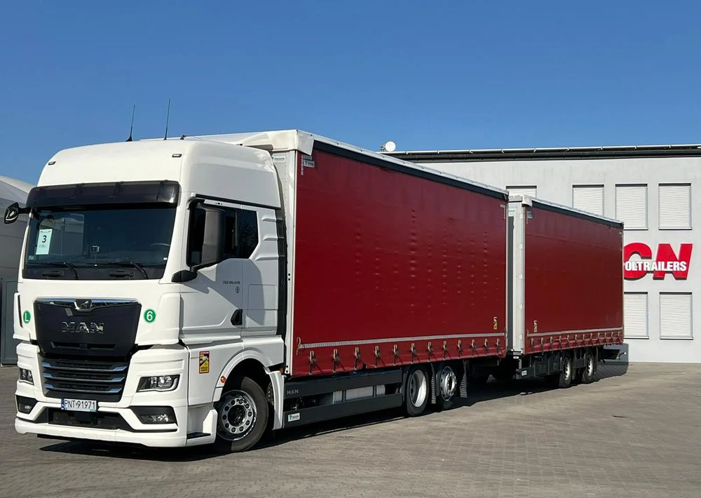 MAN TGX 26.470 z przyczepą Redos - Camion à rideaux coulissants, Remorque rideaux coulissants: photos 1 MAN TGX 26.470 z przyczepą Redos - Camion à rideaux coulissants, Remorque rideaux coulissants: photos 1