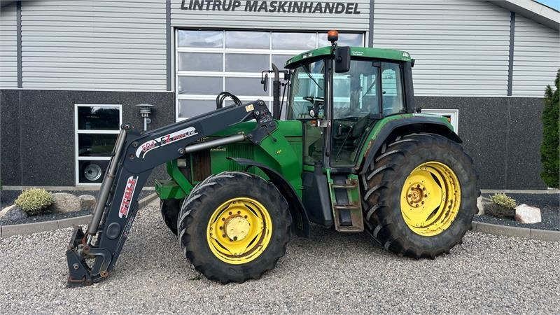John Deere 6910 Auto Quad II-TLS Med frontlæsser - Tracteur agricole: photos 1 John Deere 6910 Auto Quad II-TLS Med frontlæsser - Tracteur agricole: photos 1