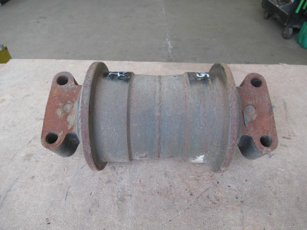 New Holland 73181638 - Galet à chenilles pour Engins de chantier: photos 1 New Holland 73181638 - Galet à chenilles pour Engins de chantier: photos 1