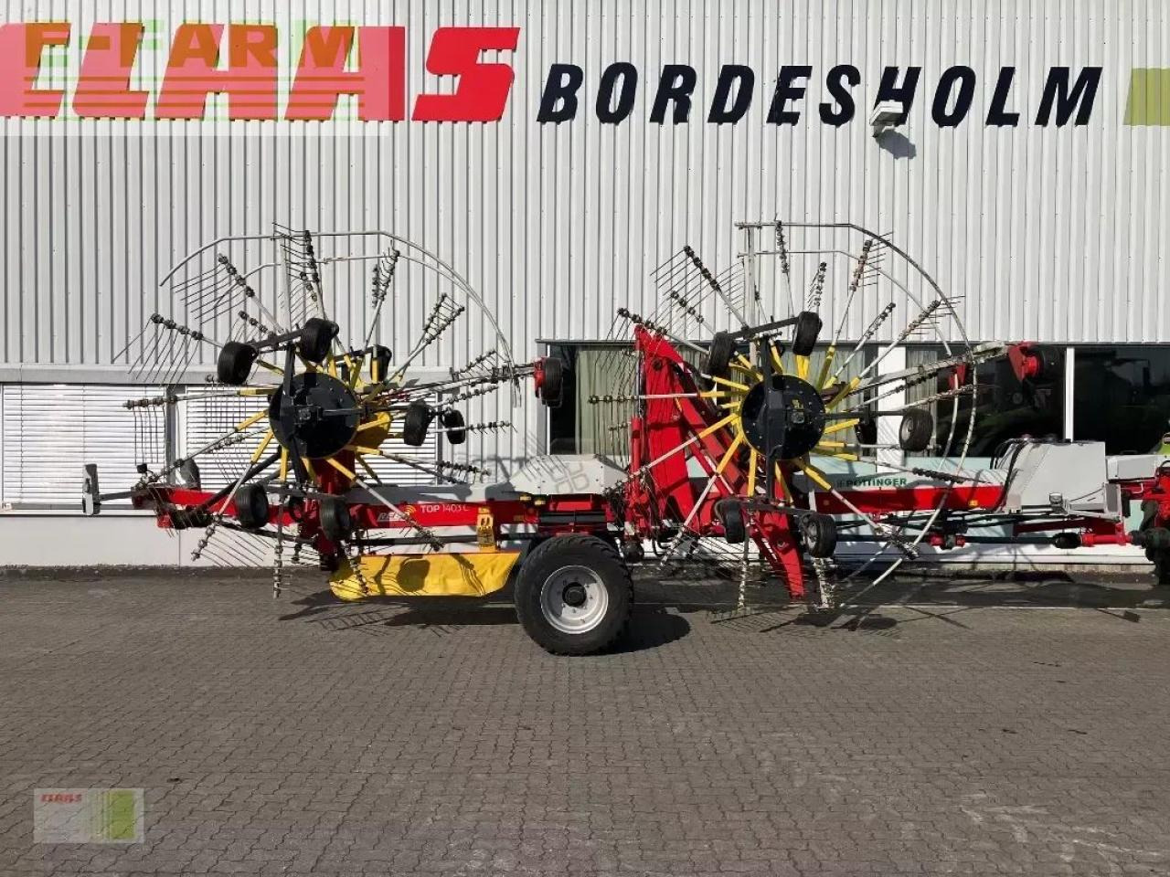 Pöttinger top 1403 c - Faneuse: photos 1 Pöttinger top 1403 c - Faneuse: photos 1