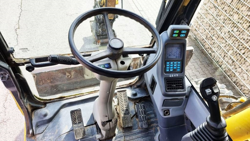 Pelle sur pneus Komatsu PW 140 Mobilbagger Powertilt Schnellwechsler MS 10: photos 12 Pelle sur pneus Komatsu PW 140 Mobilbagger Powertilt Schnellwechsler MS 10: photos 12