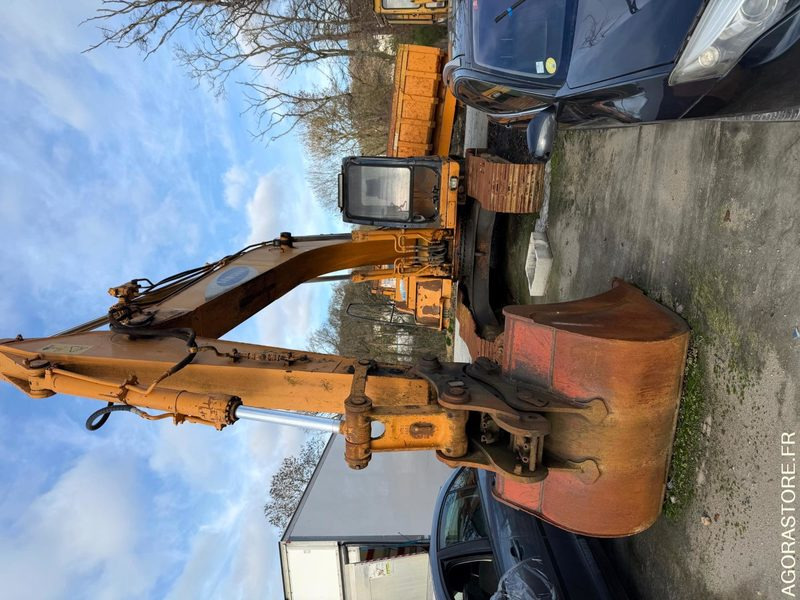 PELLE Samsung Volvo SE 210 LC - 9600heures - 1998 - Pelle: photos 1 PELLE Samsung Volvo SE 210 LC - 9600heures - 1998 - Pelle: photos 1