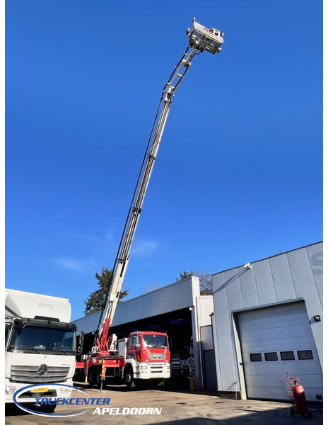 MAN TGA 26.350 Magirus ALP 320L = 32 meter, Waterpump, 6x4, Steel springs - Camion de pompier: photos 1 MAN TGA 26.350 Magirus ALP 320L = 32 meter, Waterpump, 6x4, Steel springs - Camion de pompier: photos 1
