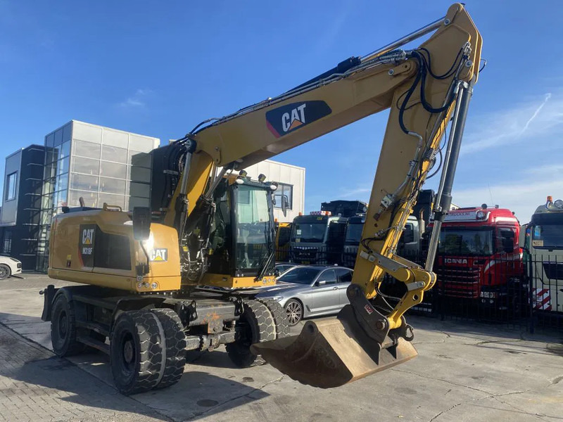 Caterpillar M318F - Pelle sur pneus: photos 3 Caterpillar M318F - Pelle sur pneus: photos 3