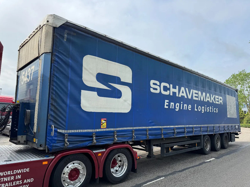 Schmitz Cargobull SCS 24/L - 3 AXLE SAF MEGA - Semi-remorque rideaux coulissants: photos 1 Schmitz Cargobull SCS 24/L - 3 AXLE SAF MEGA - Semi-remorque rideaux coulissants: photos 1