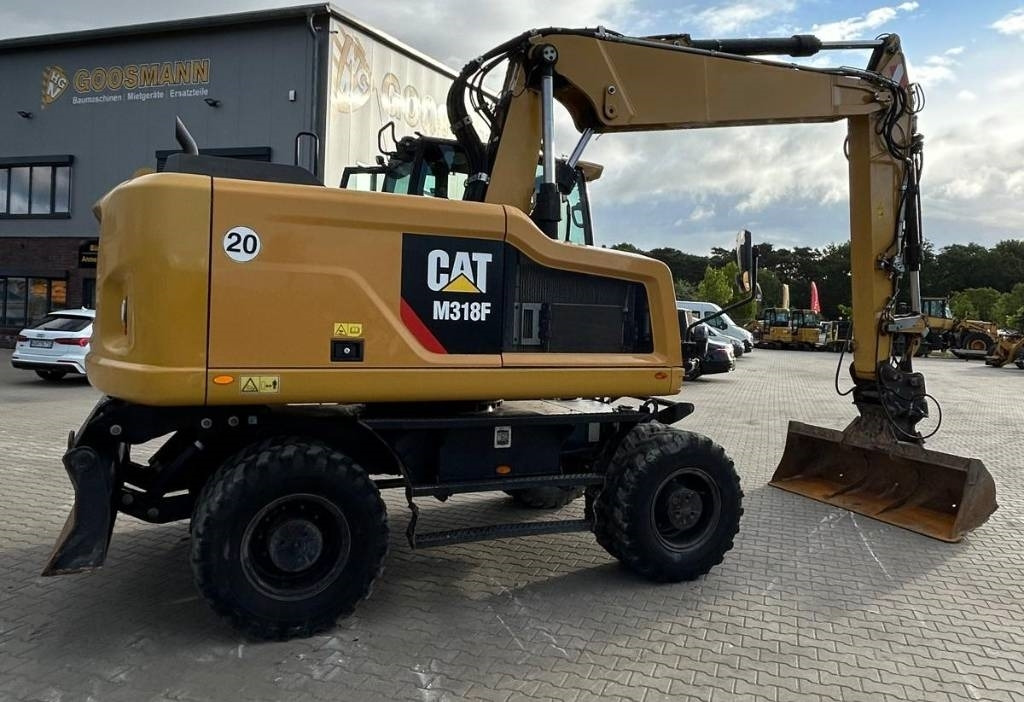 CAT M 318 F - Pelle sur pneus: photos 3 CAT M 318 F - Pelle sur pneus: photos 3