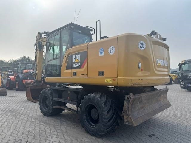 CAT M 320 F - Pelle sur pneus: photos 2 CAT M 320 F - Pelle sur pneus: photos 2