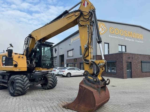 CAT M 320 F - Pelle sur pneus: photos 5 CAT M 320 F - Pelle sur pneus: photos 5