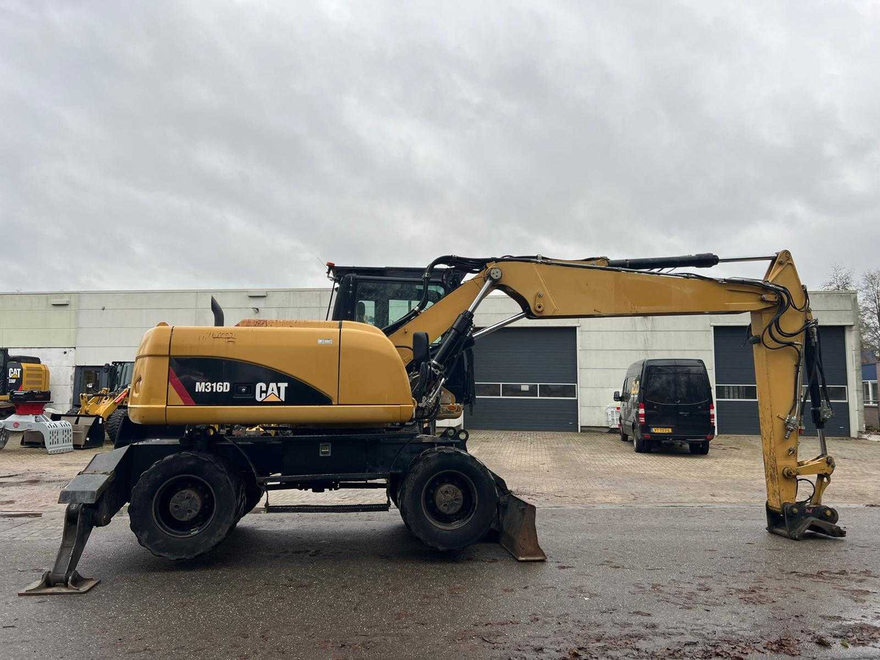 Caterpillar M316D - Pelle sur pneus: photos 4 Caterpillar M316D - Pelle sur pneus: photos 4