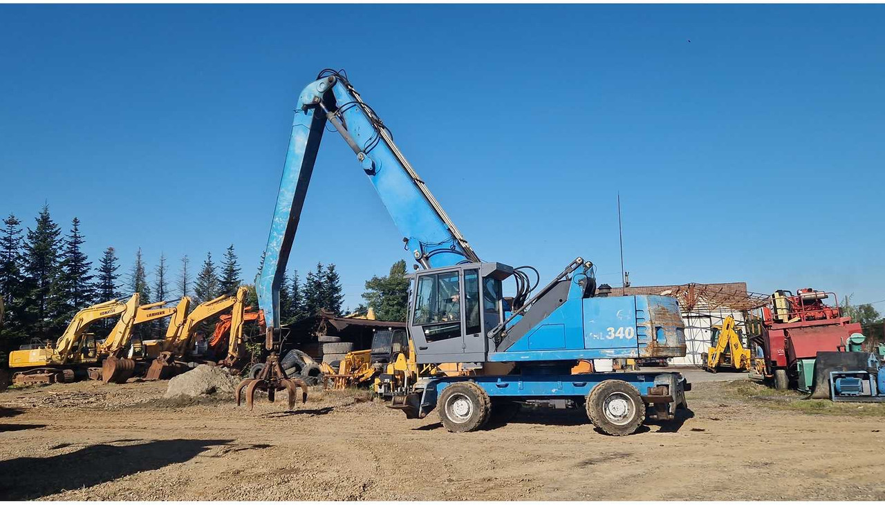 TEREX FUCHS - MHL 340 - WHEELED EXCAVATOR - 2011 - Pelle sur pneus: photos 1 TEREX FUCHS - MHL 340 - WHEELED EXCAVATOR - 2011 - Pelle sur pneus: photos 1