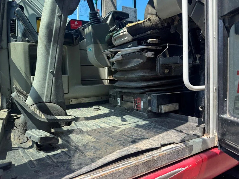 Pelle sur pneus Takeuchi TB1160W: photos 9