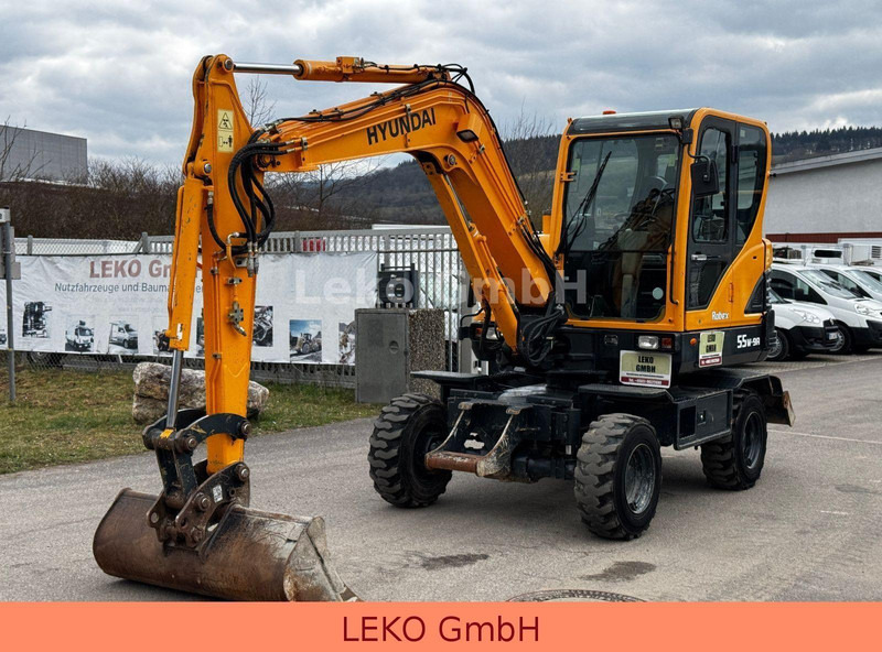 Hyundai Robex 55W-9A Mit Drei Löffeln - Pelle sur pneus: photos 3 Hyundai Robex 55W-9A Mit Drei Löffeln - Pelle sur pneus: photos 3