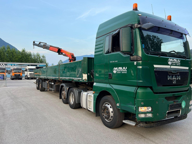 MAN TGX 26.440 6x2 + Flatbed semi trailer + Crane PK26002 - Tracteur routier: photos 2 MAN TGX 26.440 6x2 + Flatbed semi trailer + Crane PK26002 - Tracteur routier: photos 2