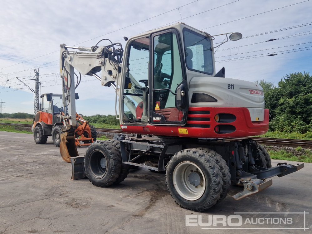 2013 Takeuchi TB295W - Pelle sur pneus: photos 3 2013 Takeuchi TB295W - Pelle sur pneus: photos 3