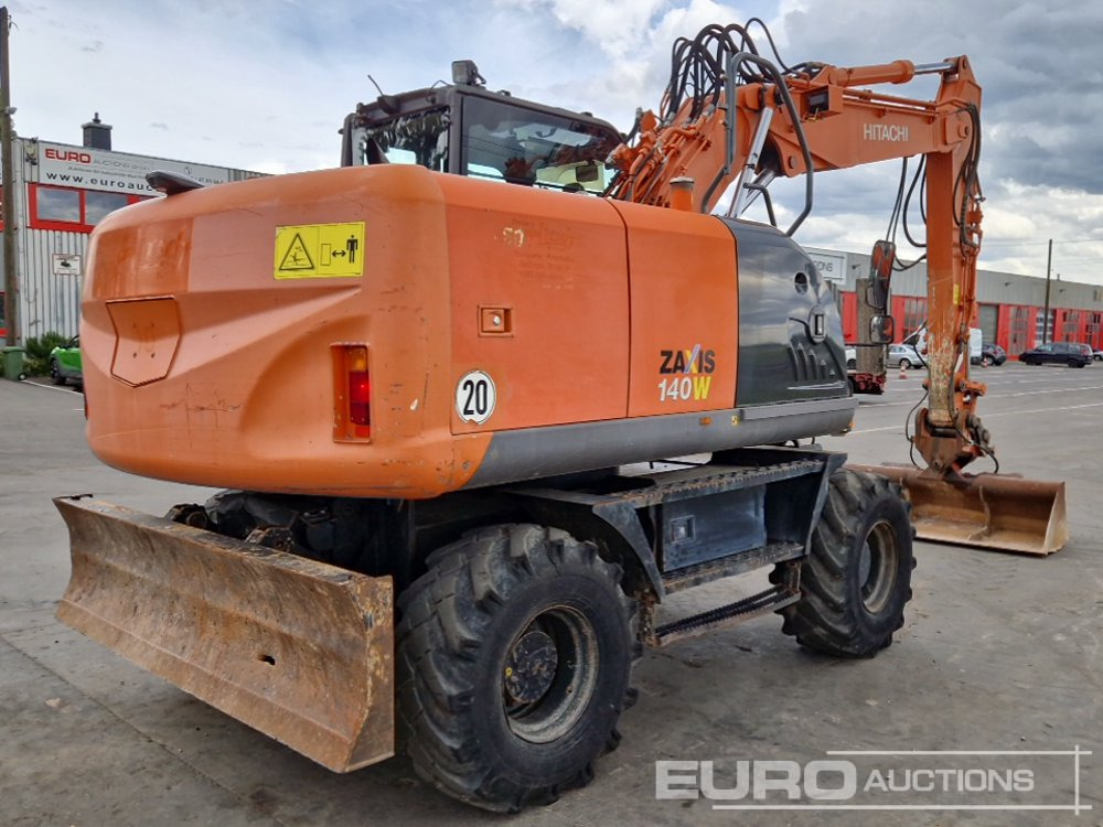 Hitachi ZX140W-3 - Pelle sur pneus: photos 5 Hitachi ZX140W-3 - Pelle sur pneus: photos 5