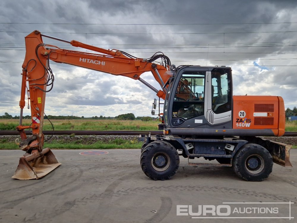 Hitachi ZX140W-3 - Pelle sur pneus: photos 2 Hitachi ZX140W-3 - Pelle sur pneus: photos 2