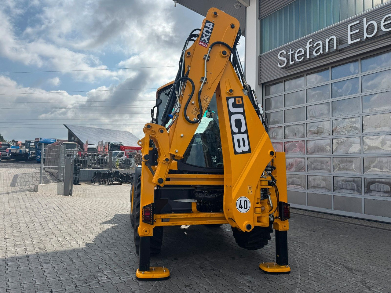 Tractopelle JCB 4CX Pro / Klappschaufel / Dual Drive / Neu: photos 7