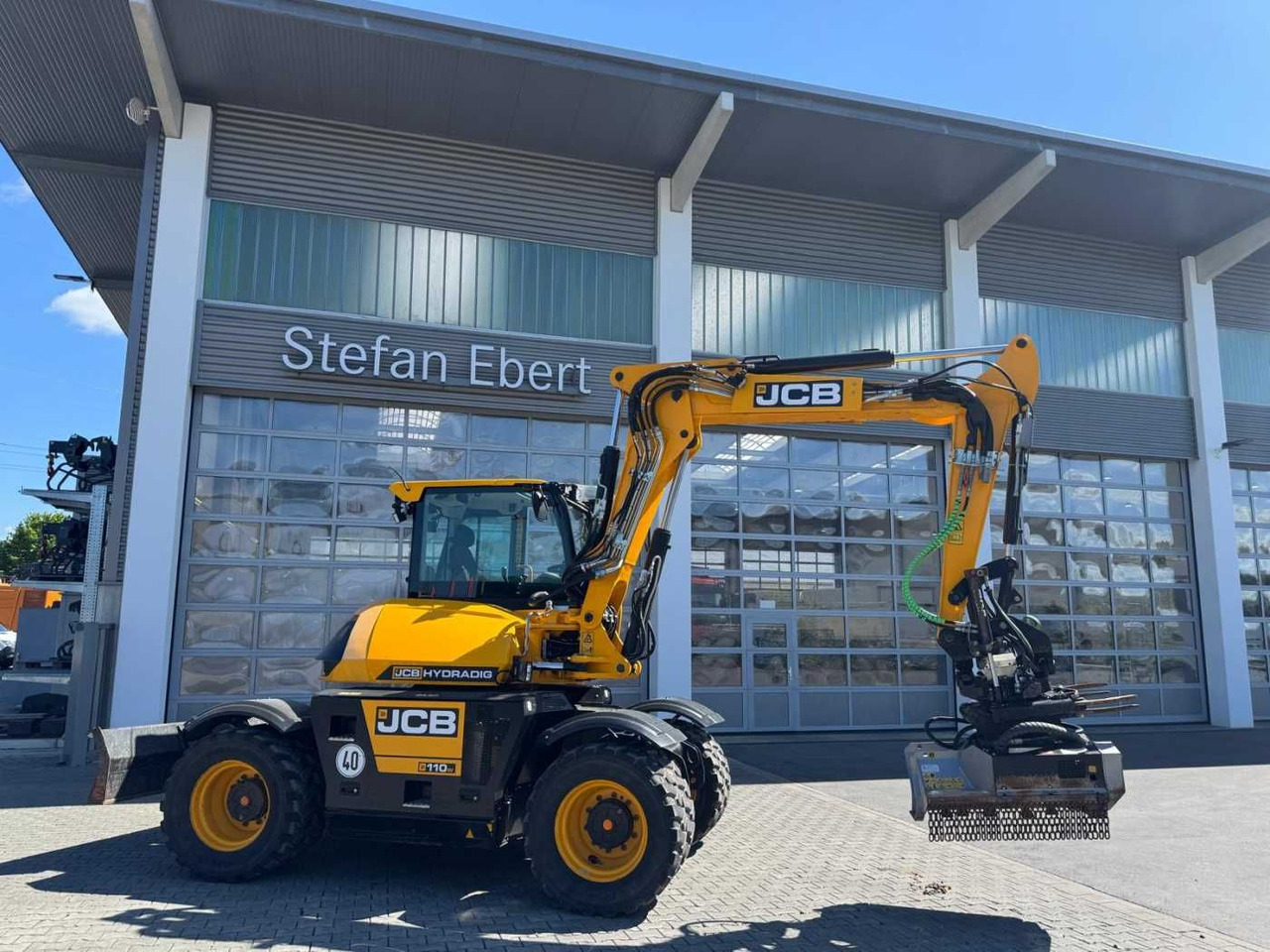 JCB Hydradig HD 110WT / 2021 / 516h! / Tiltrotator - Pelle sur pneus: photos 1 JCB Hydradig HD 110WT / 2021 / 516h! / Tiltrotator - Pelle sur pneus: photos 1