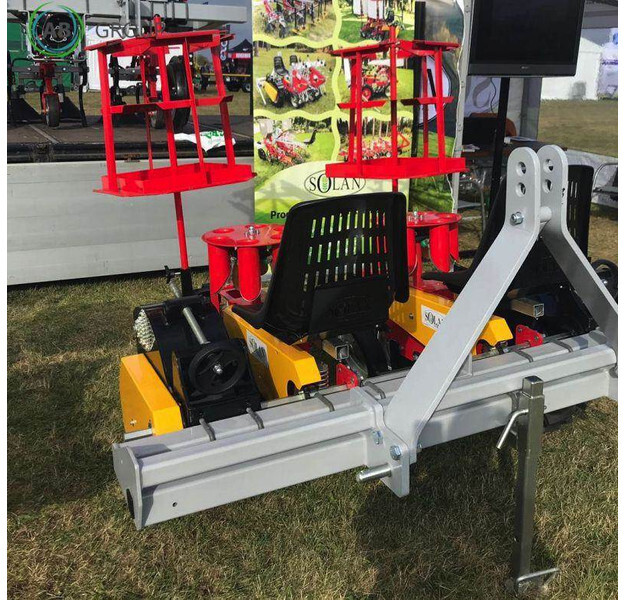 Solan Semi-automatic carousel planter 2 rows/Pflan - Planteuse de pommes de terre: photos 1 Solan Semi-automatic carousel planter 2 rows/Pflan - Planteuse de pommes de terre: photos 1
