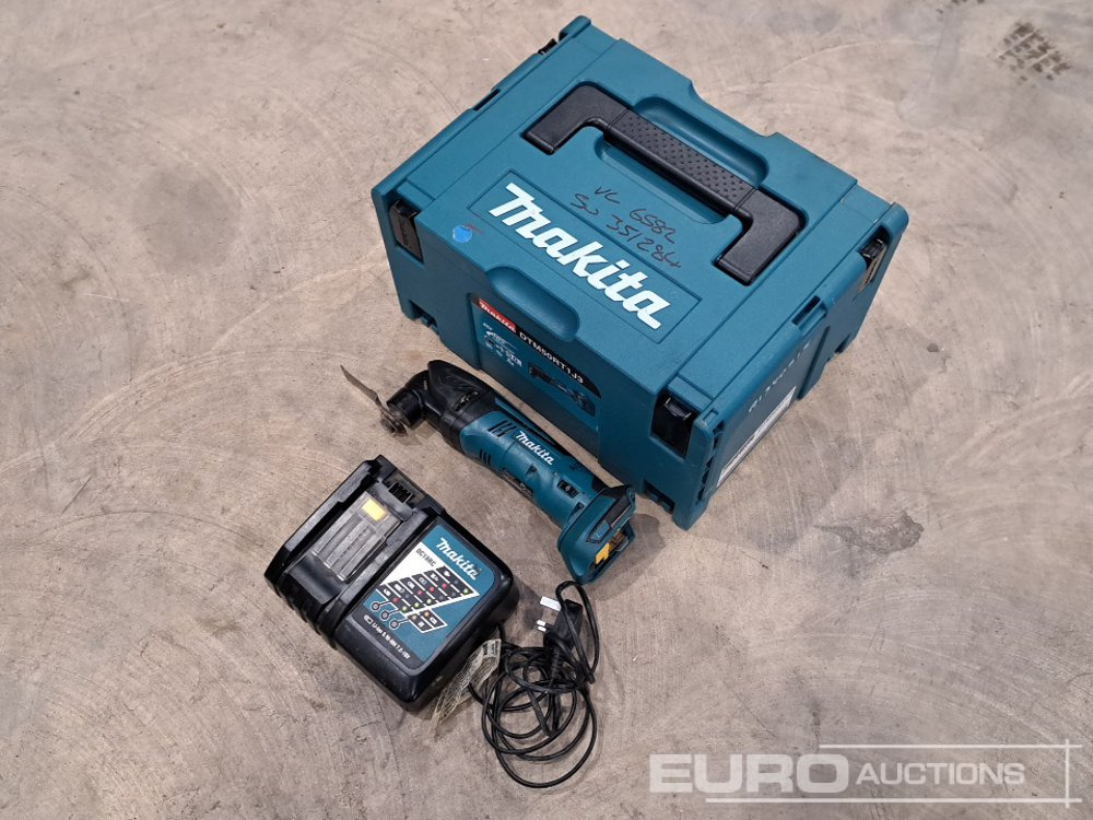 Makita DTM50 18 Volt Multi Tool (Body, Charger, Case) - Matériel de chantier: photos 1 Makita DTM50 18 Volt Multi Tool (Body, Charger, Case) - Matériel de chantier: photos 1