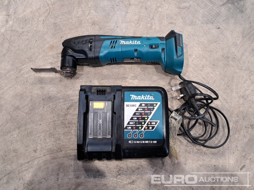Makita DTM50 18 Volt Multi Tool (Body, Charger, Case) - Matériel de chantier: photos 4 Makita DTM50 18 Volt Multi Tool (Body, Charger, Case) - Matériel de chantier: photos 4