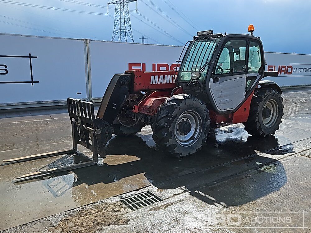 Manitou MT732 - Chariot télescopique: photos 1 Manitou MT732 - Chariot télescopique: photos 1