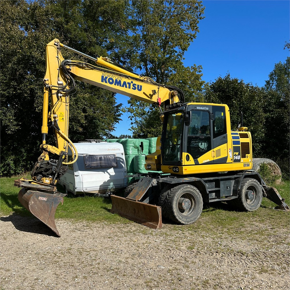 Komatsu PW148-11 - Pelle sur pneus: photos 3 Komatsu PW148-11 - Pelle sur pneus: photos 3