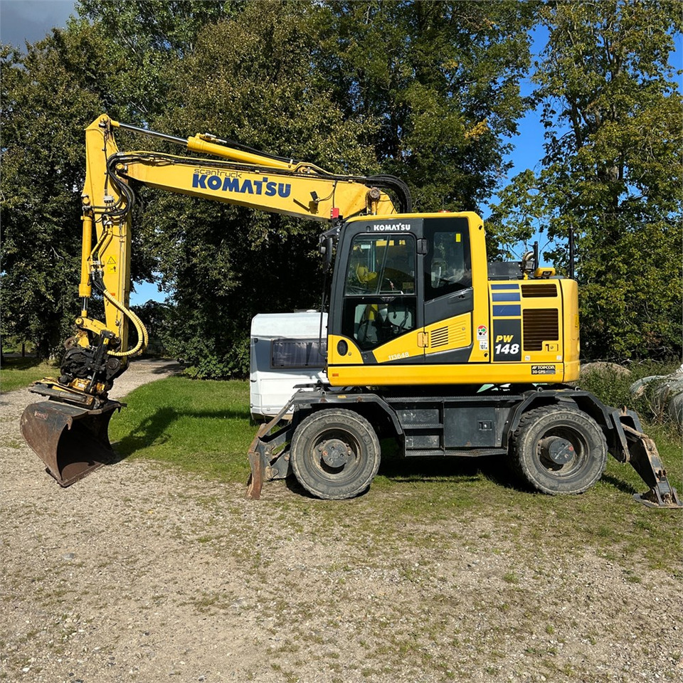 Komatsu PW148-11 - Pelle sur pneus: photos 1 Komatsu PW148-11 - Pelle sur pneus: photos 1